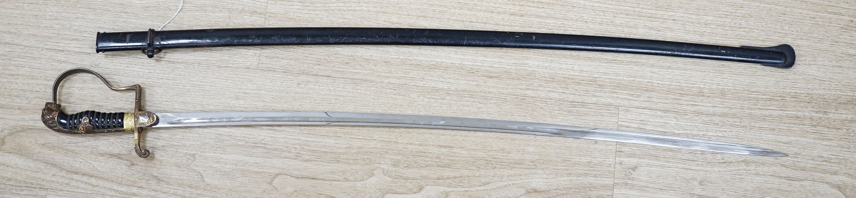 A German cavalry dress sword, provenance Desert Rats, length 102cm